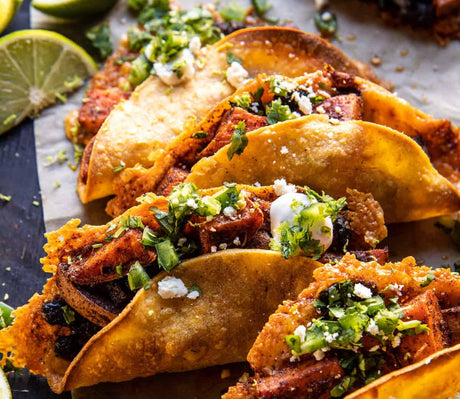Crispy Cauliflower & Sweet Potato Tacos with Avocado Lime Crema